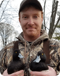 andrew bouton portrait holding two ducks