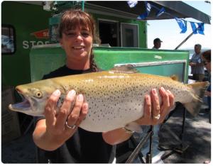 Woman holding fish