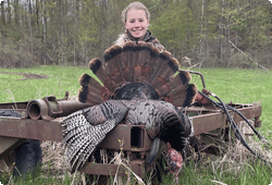  young girl with bagged turkey