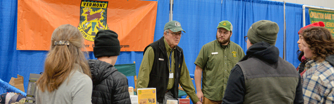 hunter ed instructor with three students