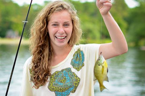 young woman with a sunfish