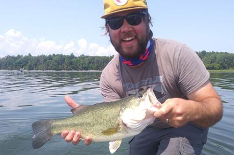 angler with bass